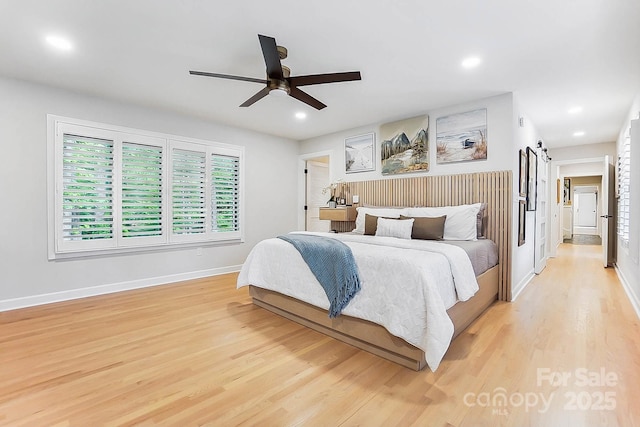 115 Forestcliff Ct NE, Concord, NC 28025 - bedroom with light wood finished floors, baseboards, recessed lighting, and ceiling fan