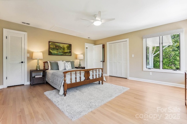 115 Forestcliff Ct NE, Concord, NC 28025 - bedroom with attic access, light wood-style flooring, baseboards, and a ceiling fan