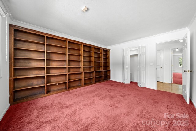 1152 Bent Tree Dr Unit F2Garage, Hendersonville, NC 28739 - unfurnished bedroom with carpet floors, crown molding, baseboards, and a closet