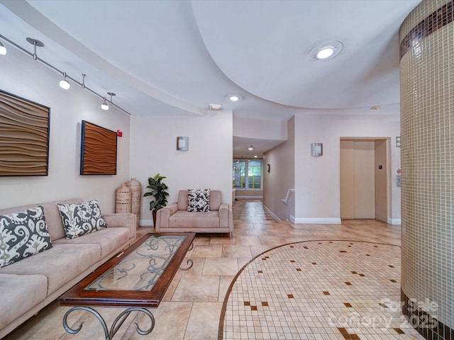 1000 E Woodlawn Rd Unit 402, Charlotte, NC 28209 - living room featuring recessed lighting, baseboards, and elevator