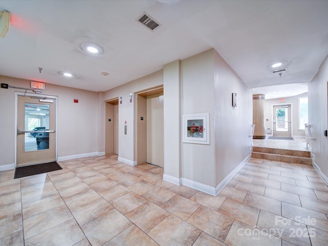 1000 E Woodlawn Rd Unit 402, Charlotte, NC 28209 - building lobby with visible vents