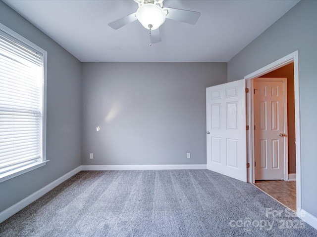 1000 E Woodlawn Rd Unit 402, Charlotte, NC 28209 - interior space with baseboards, carpet, and a healthy amount of sunlight
