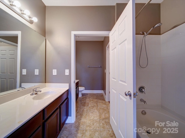 1000 E Woodlawn Rd Unit 402, Charlotte, NC 28209 - bathroom with tile patterned flooring, vanity, baseboards, toilet, and  shower combination