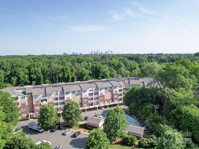 1000 E Woodlawn Rd Unit 402, Charlotte, NC 28209 - aerial view with a wooded view