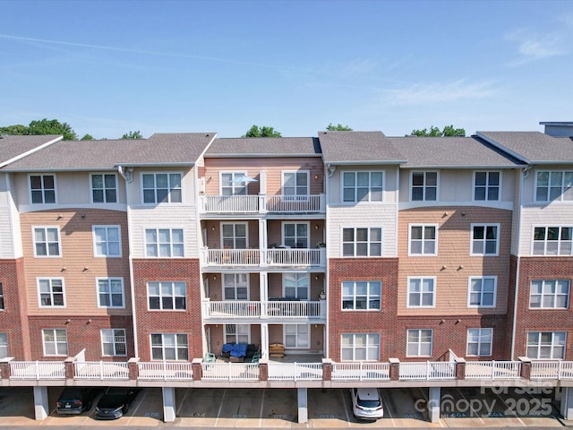1000 E Woodlawn Rd Unit 402, Charlotte, NC 28209 - view of building exterior with parking