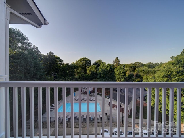 1000 E Woodlawn Rd Unit 402, Charlotte, NC 28209 - balcony featuring view of pool area