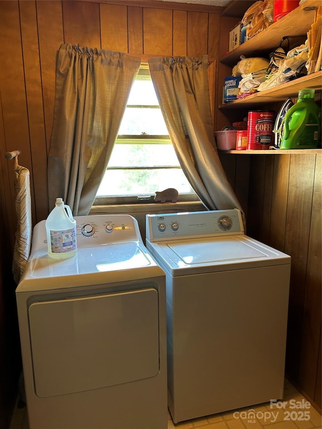laundry area featuring washing machine and dryer and laundry area