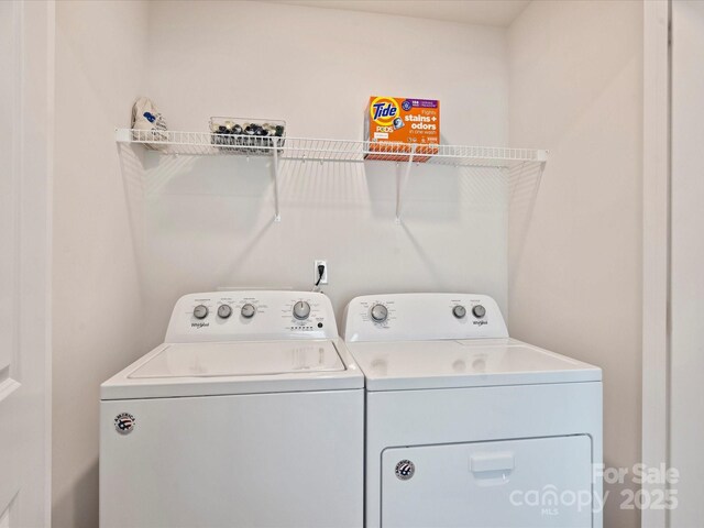 laundry room featuring laundry area and washer and dryer