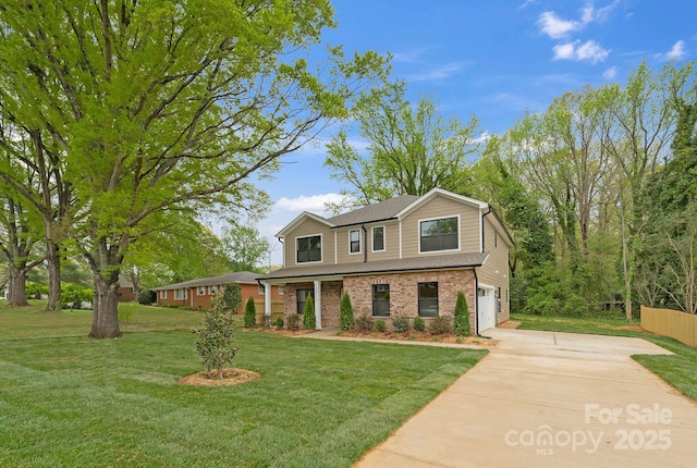 view of front facade with brick siding, an attached garage, driveway, and a front lawn