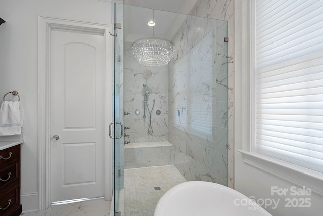 full bathroom featuring vanity, recessed lighting, marble finish floor, and a marble finish shower