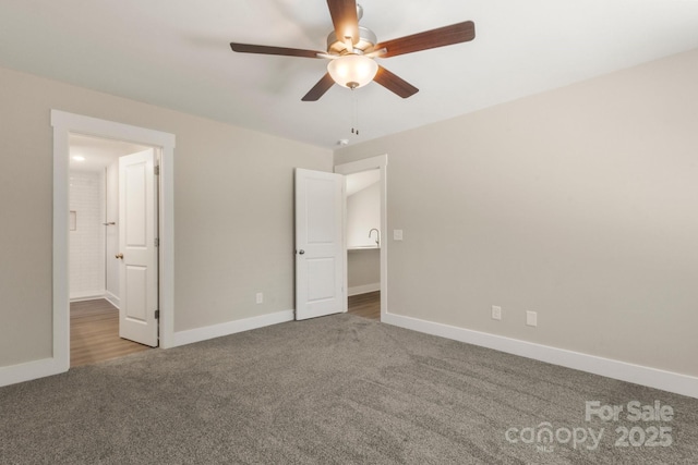 438 Forest Lake Rd, Forest City, NC 28043 - unfurnished bedroom featuring baseboards, carpet flooring, and ceiling fan
