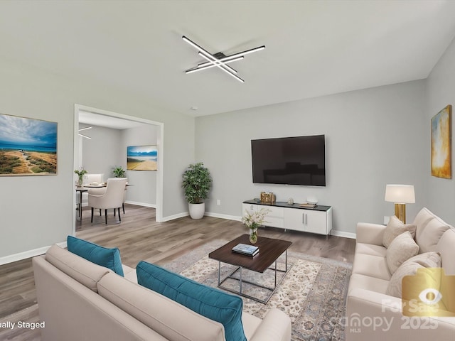 2544 Cedarwild Rd, Charlotte, NC 28212 - living area featuring baseboards and wood finished floors