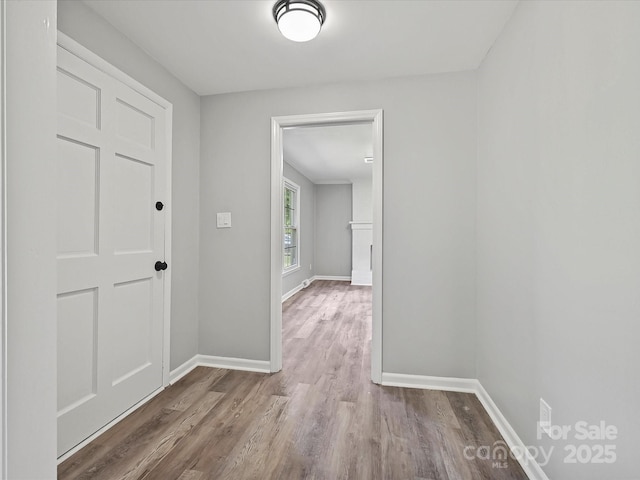 2544 Cedarwild Rd, Charlotte, NC 28212 - hallway featuring baseboards and wood finished floors
