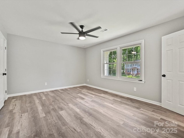 2544 Cedarwild Rd, Charlotte, NC 28212 - empty room with visible vents, baseboards, ceiling fan, and wood finished floors