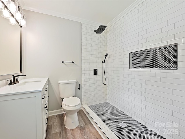 2544 Cedarwild Rd, Charlotte, NC 28212 - full bath with toilet, tiled shower, ornamental molding, and wood finished floors
