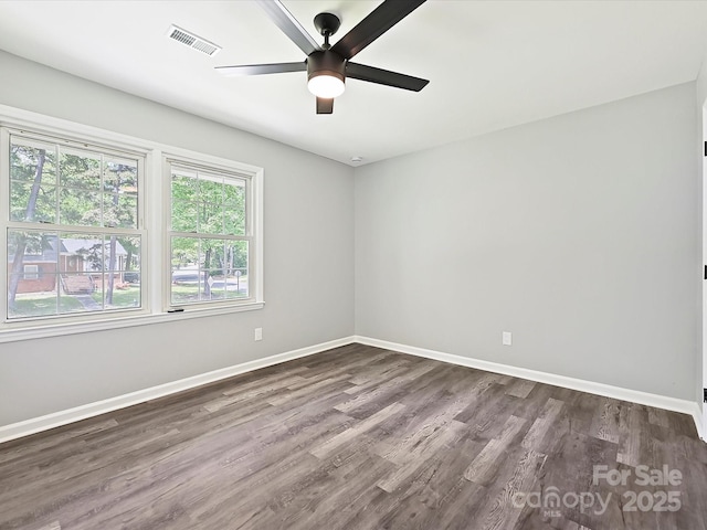 2544 Cedarwild Rd, Charlotte, NC 28212 - unfurnished room with visible vents, dark wood finished floors, ceiling fan, and baseboards