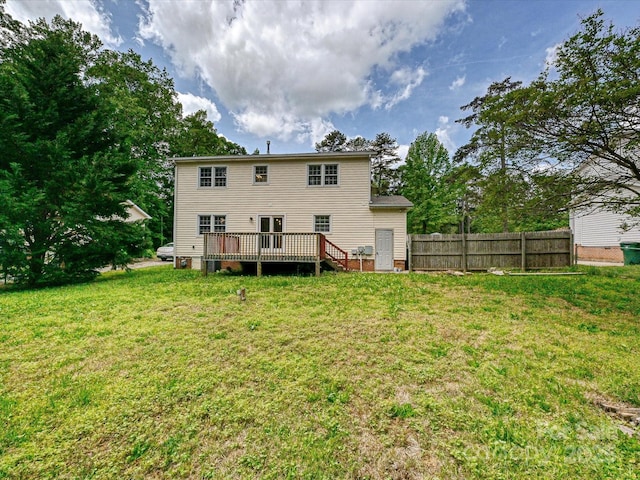 2544 Cedarwild Rd, Charlotte, NC 28212 - rear view of house with a wooden deck, a yard, and fence