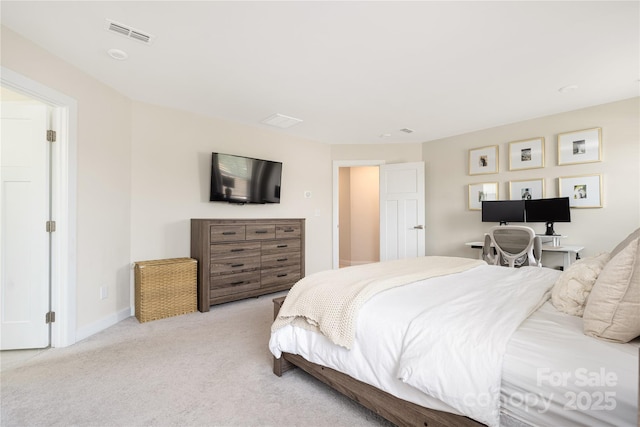 bedroom with visible vents, carpet, and baseboards