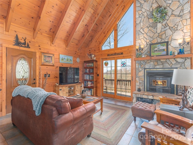 90 Junco Trl, Waynesville, NC 28785 - tiled living area with wood walls, beamed ceiling, high vaulted ceiling, and wood ceiling