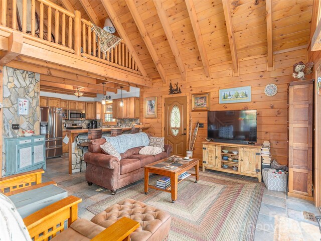 90 Junco Trl, Waynesville, NC 28785 - living room with wooden ceiling, beamed ceiling, wood walls, and high vaulted ceiling