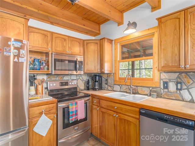 90 Junco Trl, Waynesville, NC 28785 - kitchen featuring tasteful backsplash, a sink, appliances with stainless steel finishes, wooden ceiling, and beam ceiling