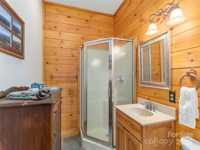 90 Junco Trl, Waynesville, NC 28785 - full bathroom featuring wood walls, vanity, and a stall shower