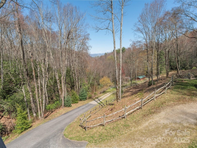 90 Junco Trl, Waynesville, NC 28785 - view of street featuring a forest view