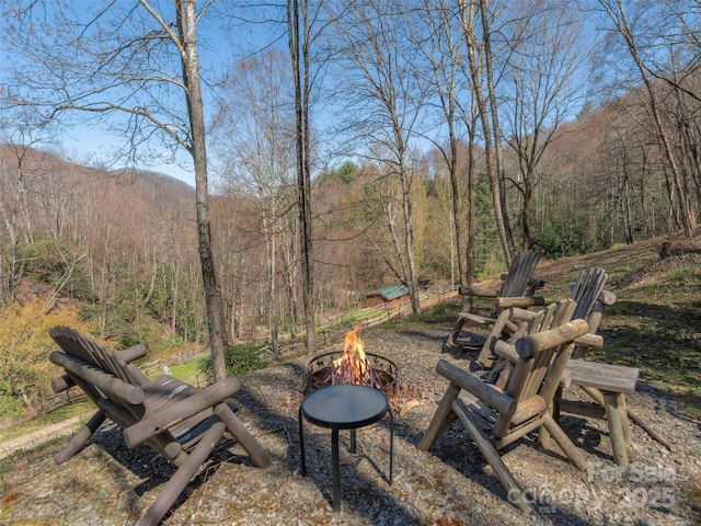90 Junco Trl, Waynesville, NC 28785 - view of yard with a fire pit and a view of trees
