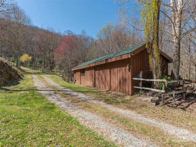 90 Junco Trl, Waynesville, NC 28785 - view of street with an outbuilding and a view of trees