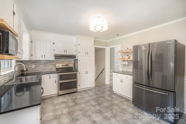 kitchen featuring stainless steel appliances, a sink, under cabinet range hood, backsplash, and open shelves