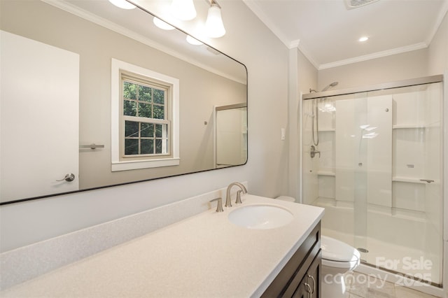 bathroom with ornamental molding, toilet, a shower stall, vanity, and tile patterned flooring