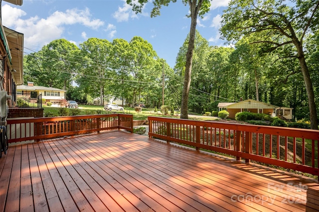 deck with view of scattered trees