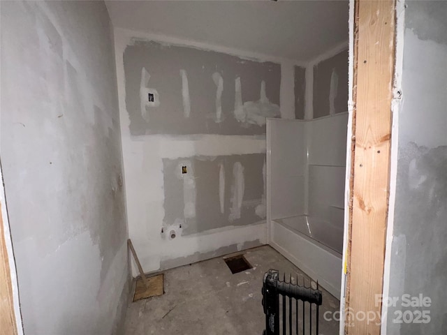 1703 Lowder St, Albemarle, NC 28001 - bathroom featuring concrete flooring and a bath