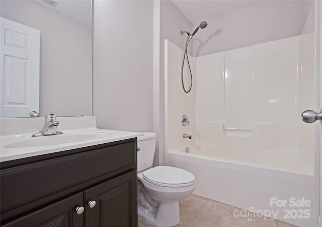 full bath featuring toilet, tile patterned flooring, vanity, and shower / washtub combination