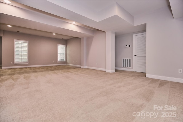 basement with carpet, baseboards, and recessed lighting
