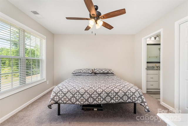 658 Morgan Rd, Albemarle, NC 28001 - bedroom featuring carpet floors, a ceiling fan, baseboards, and visible vents