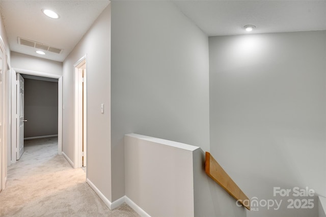 173 Greenridge Rd, Lake Wylie, SC 29710 - hall with an upstairs landing, light colored carpet, recessed lighting, and baseboards