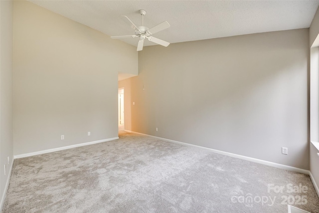 173 Greenridge Rd, Lake Wylie, SC 29710 - unfurnished room featuring a ceiling fan, carpet floors, baseboards, and lofted ceiling