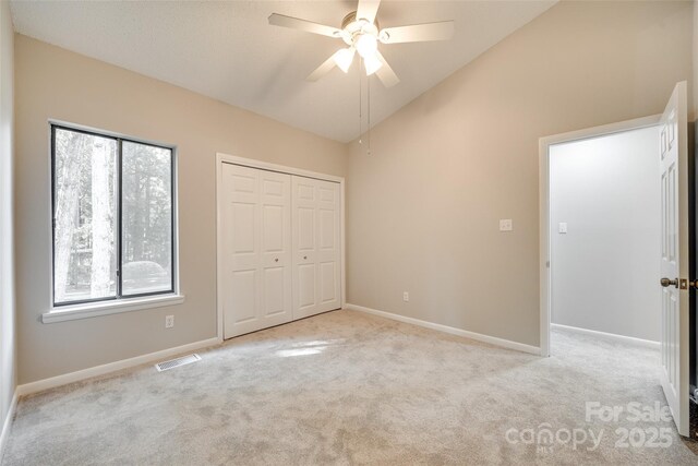 173 Greenridge Rd, Lake Wylie, SC 29710 - unfurnished bedroom with lofted ceiling, carpet, baseboards, a closet, and a ceiling fan