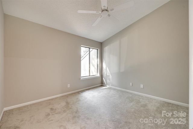 173 Greenridge Rd, Lake Wylie, SC 29710 - carpeted empty room featuring vaulted ceiling, a textured ceiling, baseboards, and a ceiling fan
