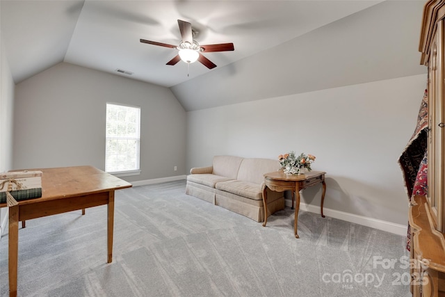 living room with baseboards, ceiling fan, lofted ceiling, and visible vents