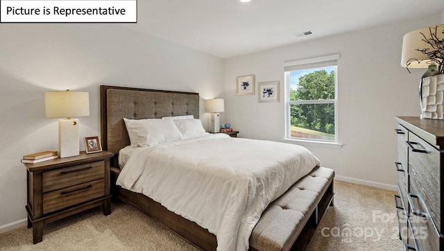 bedroom featuring baseboards, visible vents, and light carpet