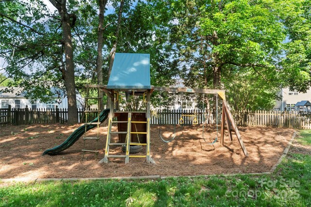 view of play area featuring fence