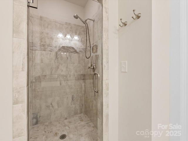 bathroom featuring a stall shower