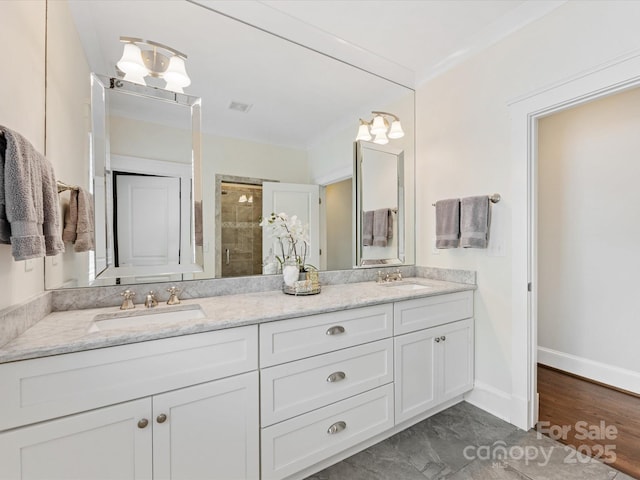 bathroom with double vanity, visible vents, a shower stall, and a sink