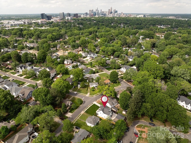 birds eye view of property with a city view