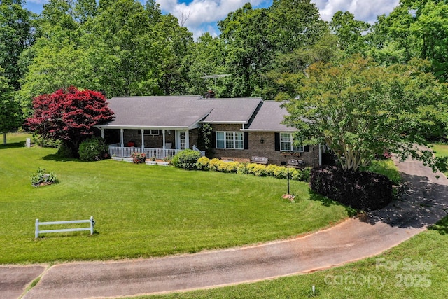 676 Cove Rd, Rutherfordton, NC 28139 - single story home with covered porch and brick siding