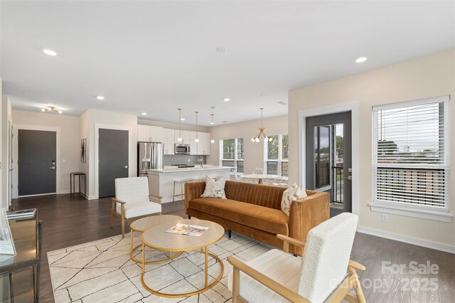 3630 N Davidson St Unit 3301, Charlotte, NC 28205 - living room featuring light wood-style floors, recessed lighting, and baseboards