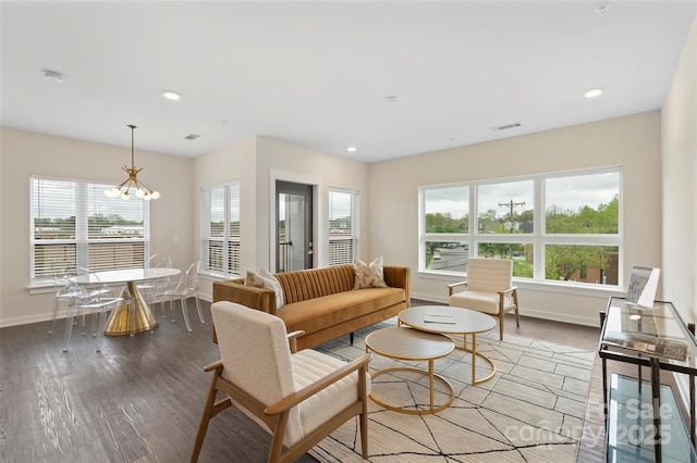 3630 N Davidson St Unit 3301, Charlotte, NC 28205 - living area featuring visible vents, wood finished floors, baseboards, recessed lighting, and a notable chandelier