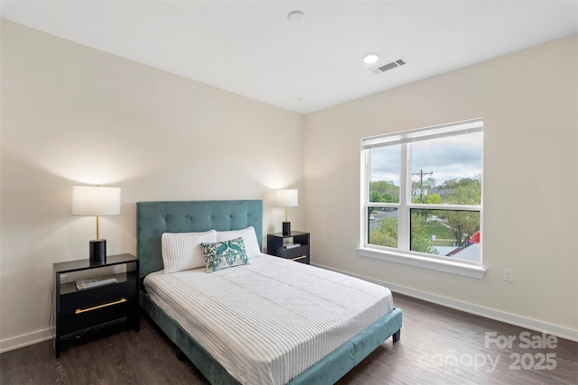 3630 N Davidson St Unit 3301, Charlotte, NC 28205 - bedroom with baseboards, visible vents, and dark wood-type flooring